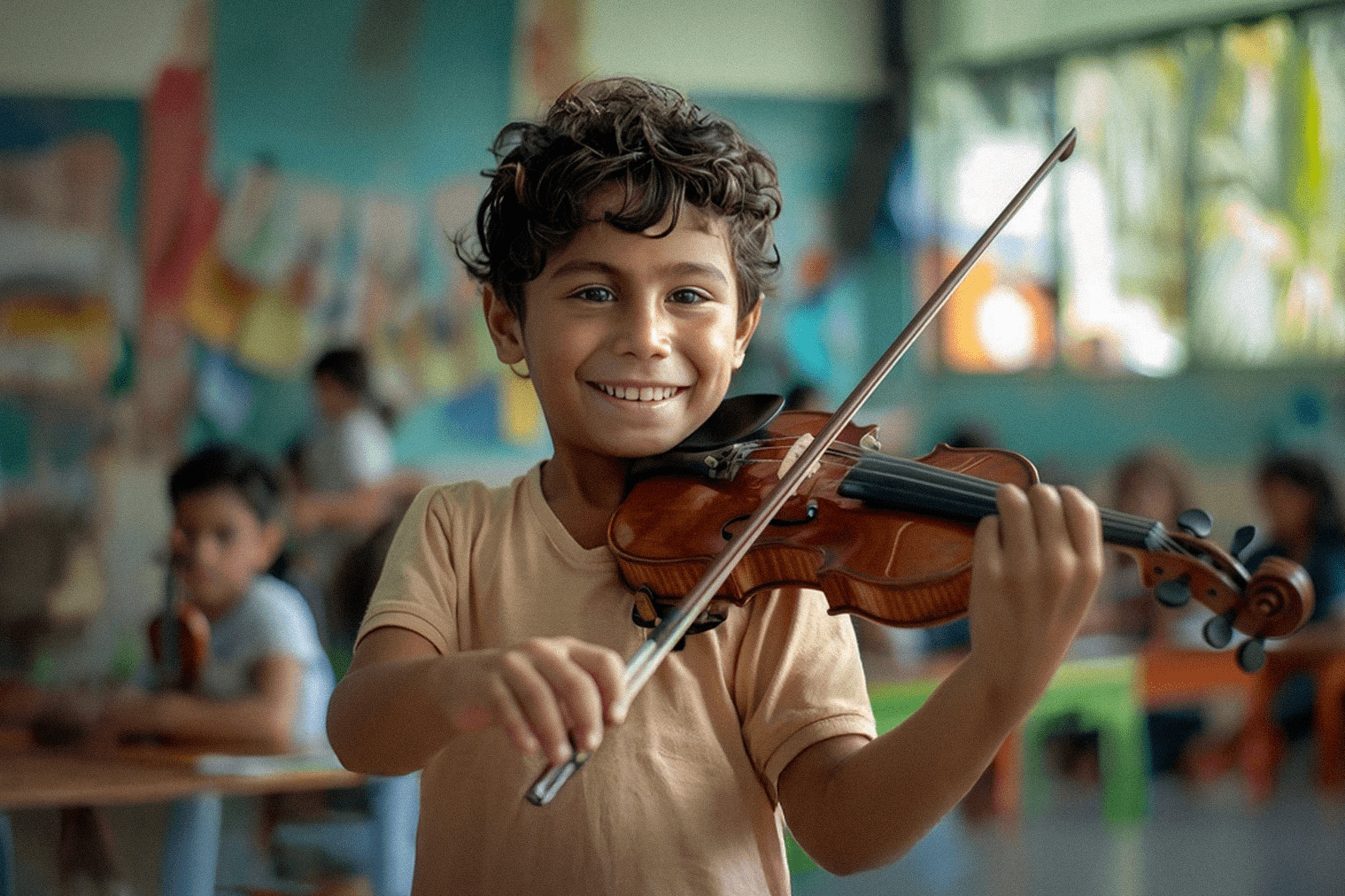 Young boy playing violin in classroom, part of El Sistema Austria music education program.